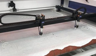 High-efficiency double-head CO2 laser cutting machine in china