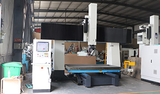 What are the applications and advantages of a 5-axis CNC machine?